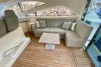 Luxurious interior of 2007 Astondoa 53 Open yacht with elegant seating and wooden flooring.