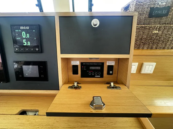  Yacht Photos Pics Control panel of a 2017 Lagoon 52 F yacht with navigation instruments.