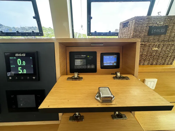  Yacht Photos Pics Control panel of a 2017 Lagoon 52 F yacht with navigation displays.