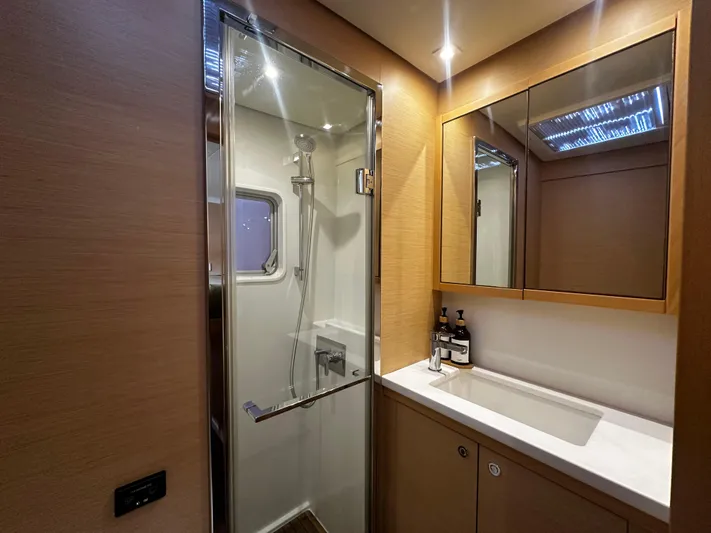 Yacht Photos Pics Luxurious bathroom in 2017 Lagoon 52 F yacht with shower and vanity.