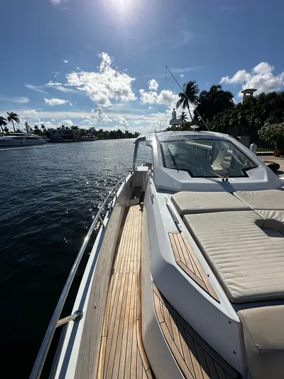  Yacht Photos Pics 2018 Azimut Verve 40 yacht on sunny waterfront with palm trees.