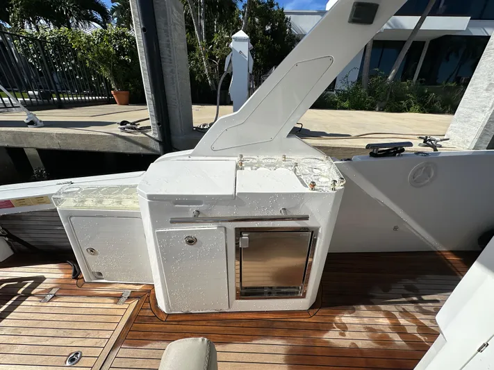 Yacht Photos Pics Outdoor kitchen area on 2018 Azimut Verve 40 yacht with wooden deck.