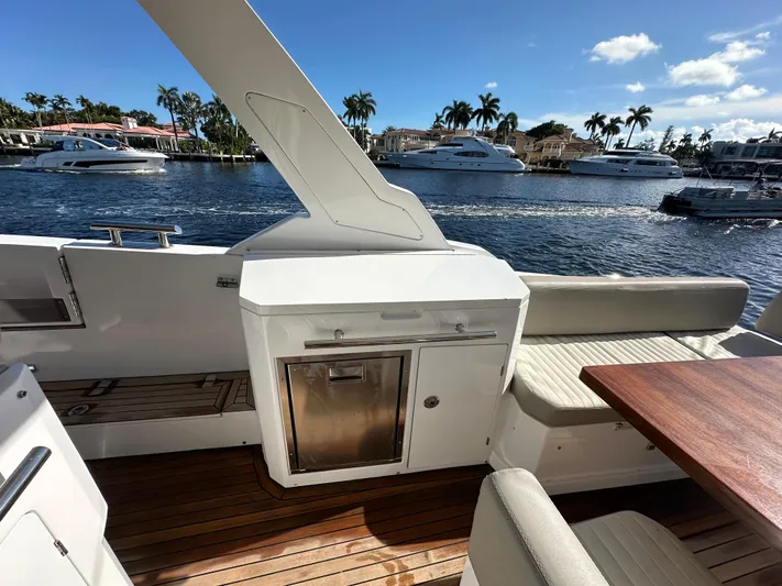  Yacht Photos Pics 2018 Azimut Verve 40 yacht deck with seating and waterfront view.