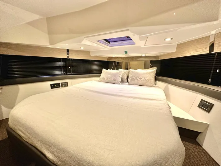  Yacht Photos Pics Luxurious cabin interior of 2018 Azimut Verve 40 yacht with cozy bedding.