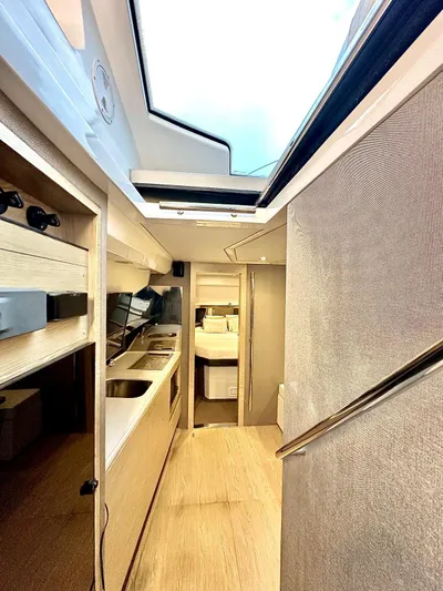  Yacht Photos Pics Interior of 2018 Azimut Verve 40 yacht, featuring modern kitchen and sleek design.