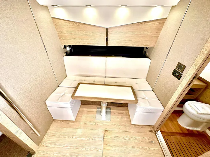  Yacht Photos Pics Luxurious interior of 2018 Azimut Verve 40 yacht with elegant seating and table.