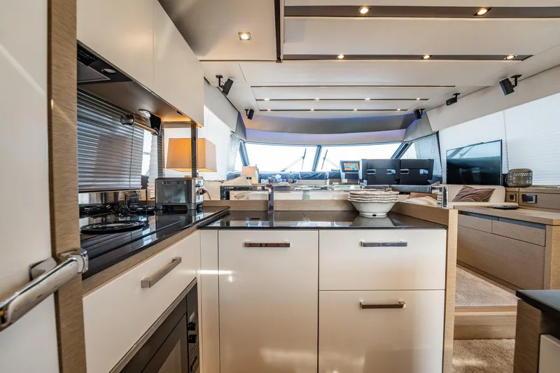 No Rush Yacht Photos Pics Luxurious interior of 2018 Prestige 630 yacht with modern kitchen and spacious living area.