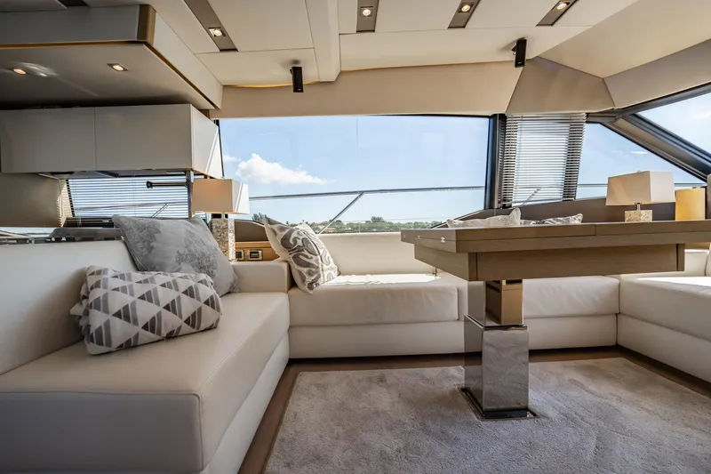 No Rush Yacht Photos Pics Luxurious interior of 2018 Prestige 630 yacht with elegant seating and modern decor.
