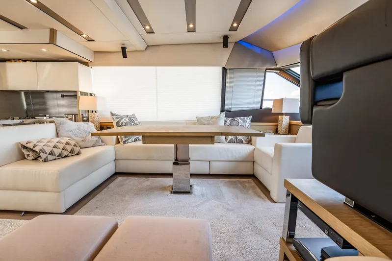 No Rush Yacht Photos Pics Luxurious interior of a 2018 Prestige 630 yacht with elegant seating and modern decor.