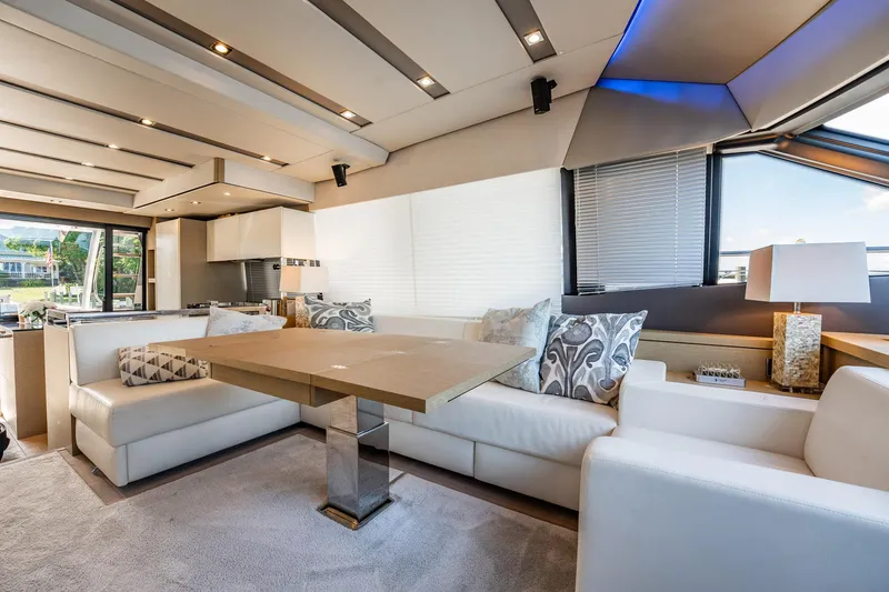 No Rush Yacht Photos Pics Luxurious interior of a 2018 Prestige 630 yacht with elegant seating and modern decor.