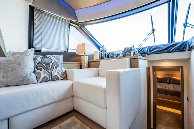 No Rush Yacht Photos Pics Luxurious interior of 2018 Prestige 630 yacht with elegant seating and modern decor.