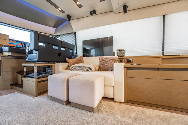 No Rush Yacht Photos Pics Luxurious interior of a 2018 Prestige 630 yacht with modern furnishings and elegant design.