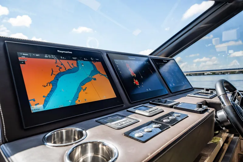 No Rush Yacht Photos Pics Cockpit of 2018 Prestige 630 yacht with navigation screens and controls.