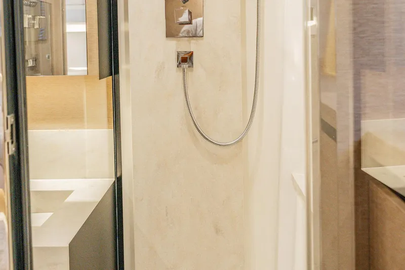 No Rush Yacht Photos Pics Luxurious bathroom interior of 2018 Prestige 630 yacht with modern shower design.