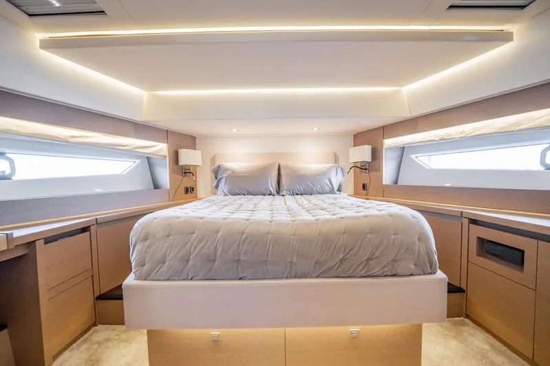 No Rush Yacht Photos Pics Luxurious bedroom interior of 2018 Prestige 630 yacht with modern lighting and elegant design.