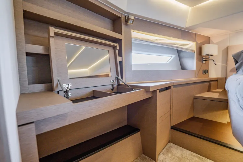 No Rush Yacht Photos Pics Luxurious interior of 2018 Prestige 630 yacht with vanity and seating area.