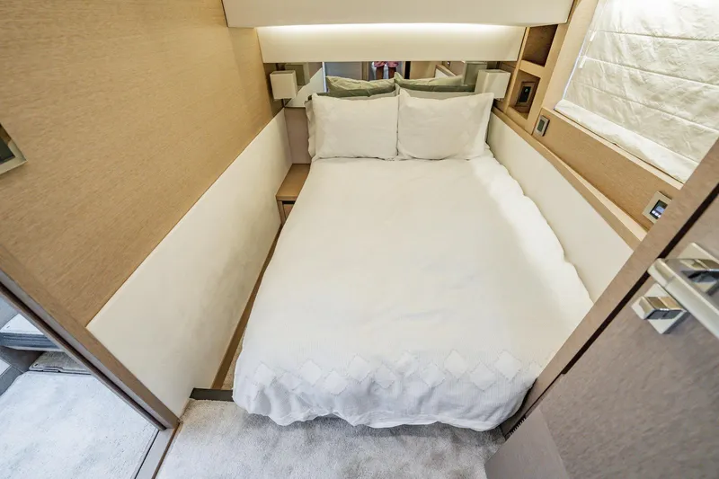 No Rush Yacht Photos Pics Luxurious bedroom interior of 2018 Prestige 630 yacht with cozy bedding.