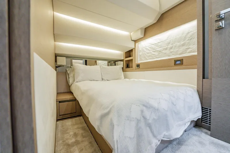 No Rush Yacht Photos Pics Luxurious bedroom interior of 2018 Prestige 630 yacht with modern design and ambient lighting.