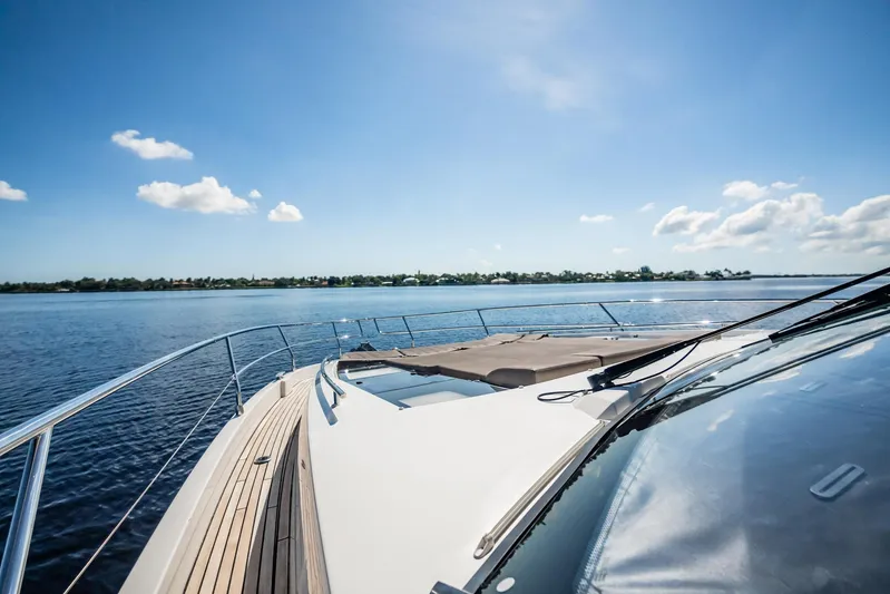 No Rush Yacht Photos Pics 2018 Prestige 630 yacht cruising on a sunny day with clear blue skies.