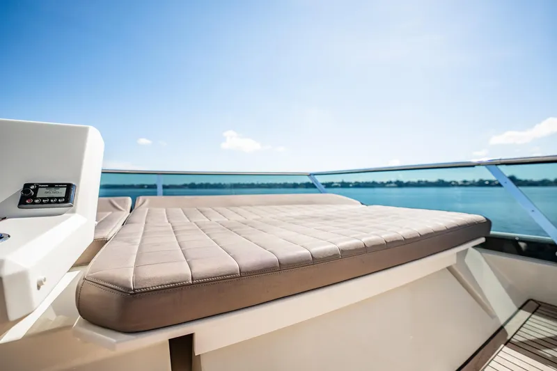 No Rush Yacht Photos Pics Luxurious sunbed on 2018 Prestige 630 yacht with serene ocean view.