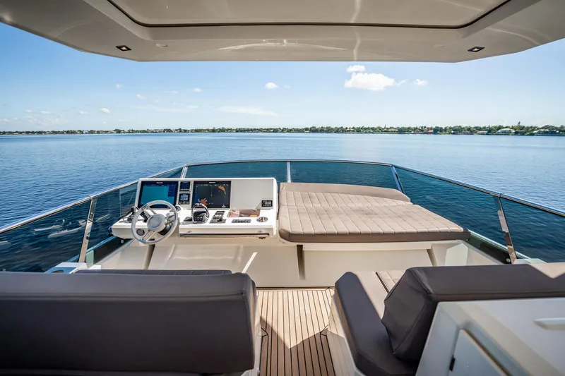 No Rush Yacht Photos Pics Luxurious 2018 Prestige 630 yacht helm with panoramic ocean view and modern controls.