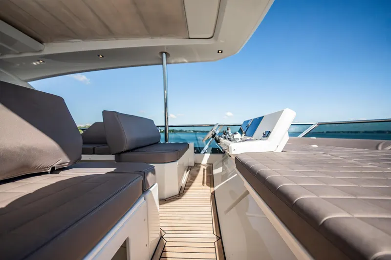 No Rush Yacht Photos Pics Luxurious 2018 Prestige 630 yacht interior with plush seating and ocean view.