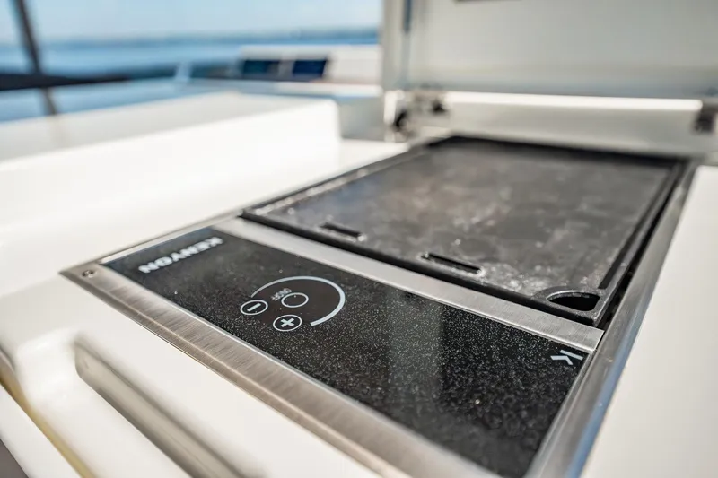 No Rush Yacht Photos Pics Built-in grill on 2018 Prestige 630 yacht, featuring sleek design and modern controls.