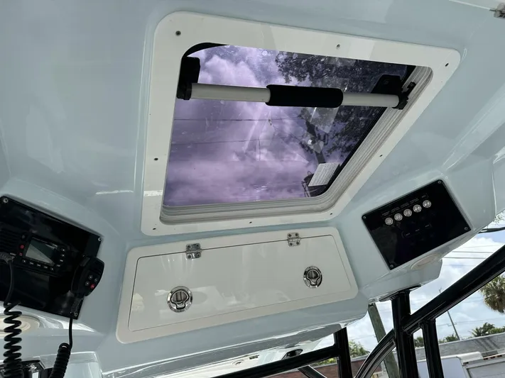  Yacht Photos Pics Interior view of 2022 Sea Fox 288 Commander boat with hatch and control panel.