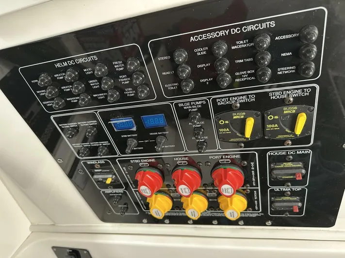  Yacht Photos Pics Control panel of a 2022 Sea Fox 288 Commander boat, featuring various circuit switches.