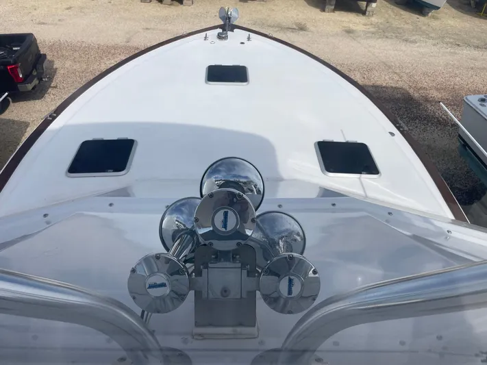 On Course Yacht Photos Pics 1986 Egg Harbor 41 Convertible boat deck with chrome fixtures and hatches.