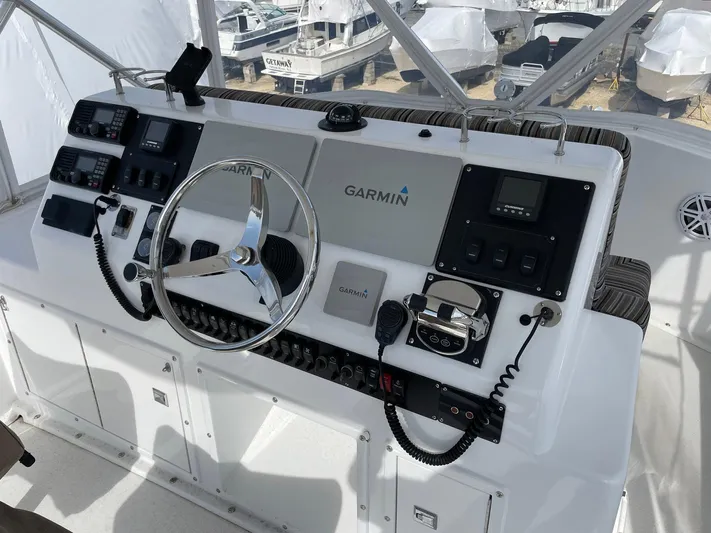 On Course Yacht Photos Pics Control panel of a 1986 Egg Harbor 41 Convertible boat with Garmin navigation system.