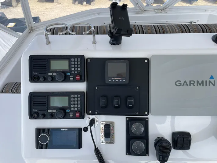 On Course Yacht Photos Pics Control panel of a 1986 Egg Harbor 41 Convertible boat with navigation equipment.