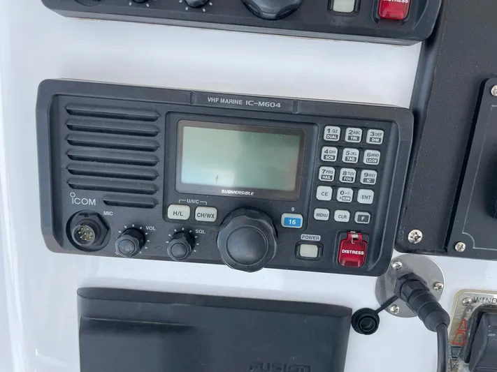 On Course Yacht Photos Pics VHF marine radio on 1986 Egg Harbor 41 Convertible boat dashboard.