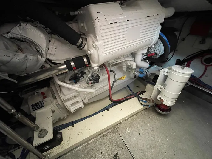 On Course Yacht Photos Pics Engine room of 1986 Egg Harbor 41 Convertible boat, showcasing mechanical components.