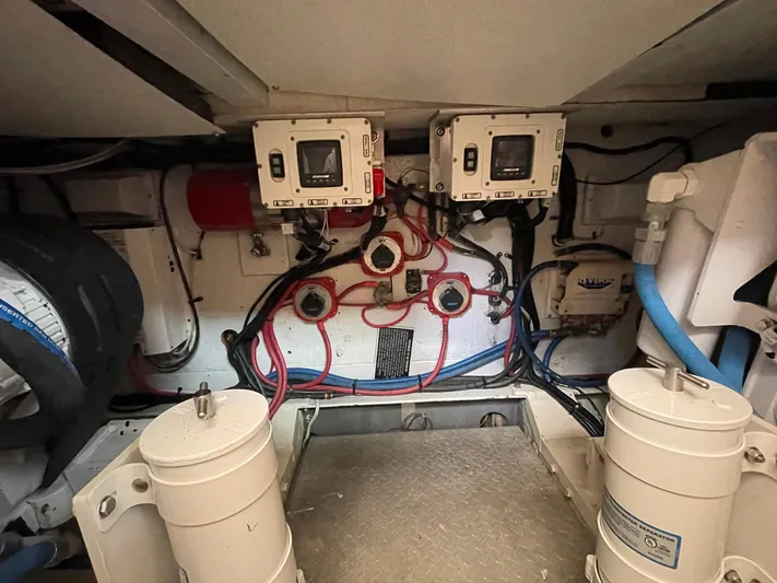 On Course Yacht Photos Pics Engine room of 1986 Egg Harbor 41 Convertible with wiring and control panels.