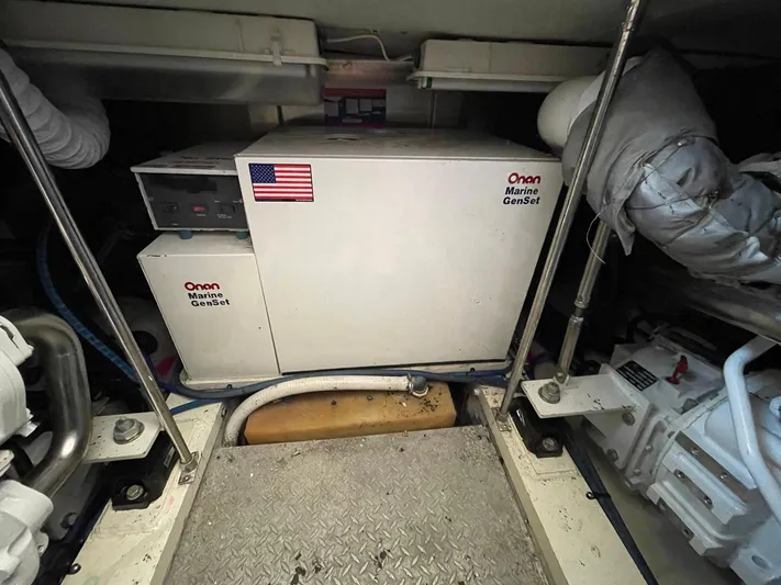 On Course Yacht Photos Pics Engine room of 1986 Egg Harbor 41 Convertible with Onan Marine GenSet.
