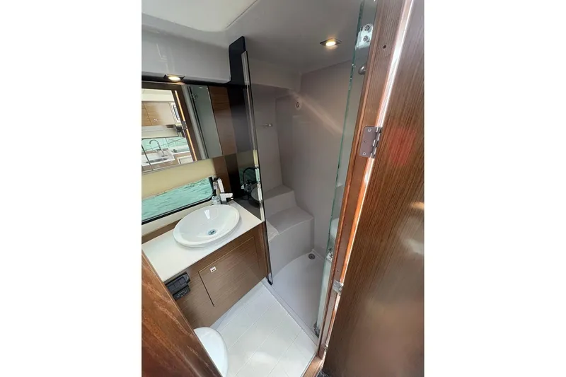  Yacht Photos Pics 2017 Cruisers Yachts 39 Express Coupe bathroom with modern sink and shower.