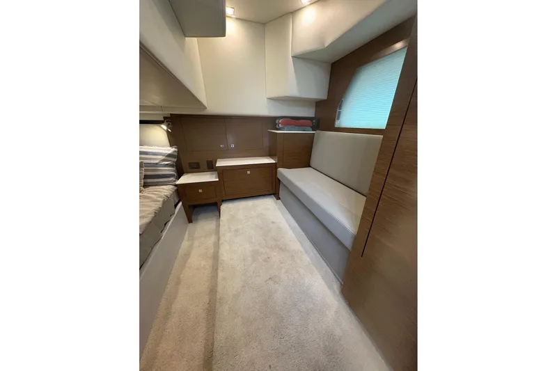  Yacht Photos Pics 2017 Cruisers Yachts 39 Express Coupe interior with modern seating and wood accents.