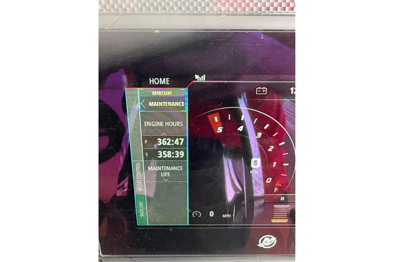  Yacht Photos Pics Dashboard display of 2017 Cruisers Yachts 39 Express Coupe showing engine hours and RPM.