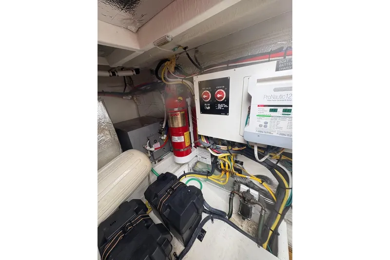  Yacht Photos Pics Engine compartment of 2017 Cruisers Yachts 39 Express Coupe with wiring and fire extinguisher.