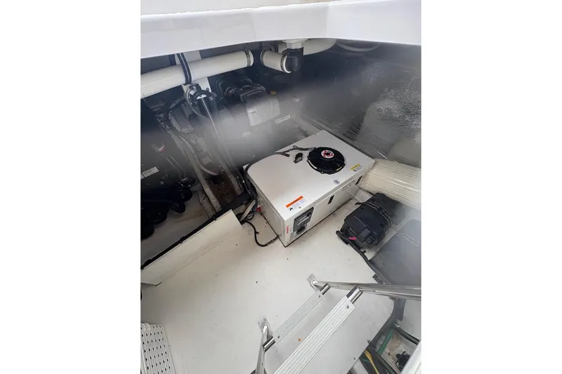  Yacht Photos Pics Engine room of 2017 Cruisers Yachts 39 Express Coupe, featuring equipment and machinery.