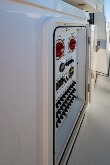 @c Yacht Photos Pics Control panel on 2022 Pursuit S 268 Sport boat, featuring switches and gauges.