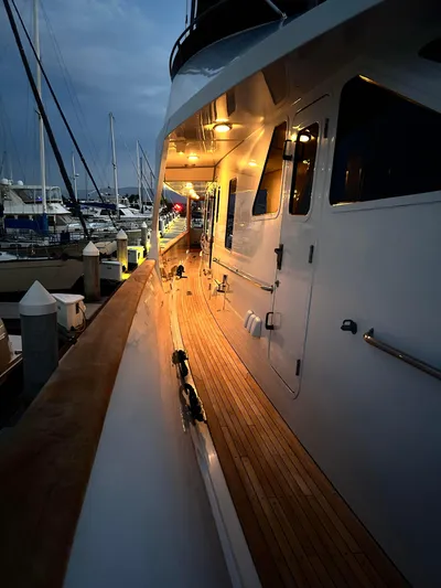 Entrepeneur Yacht Photos Pics Luxurious 1992 Christensen motor yacht docked at marina during evening.