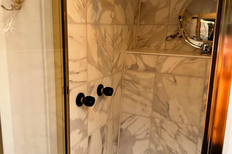 Entrepeneur Yacht Photos Pics Luxurious marble shower interior on a 1992 Christensen motor yacht.