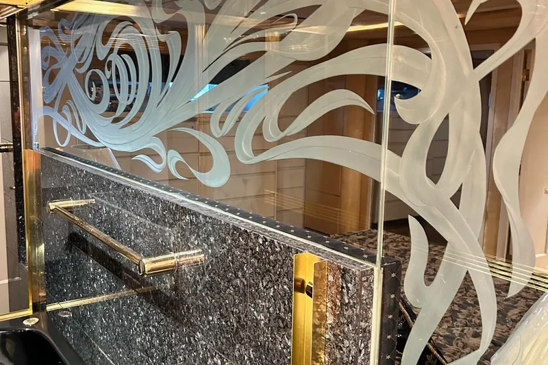 Entrepeneur Yacht Photos Pics Luxurious interior of 1992 Christensen motor yacht with elegant etched glass and marble accents.