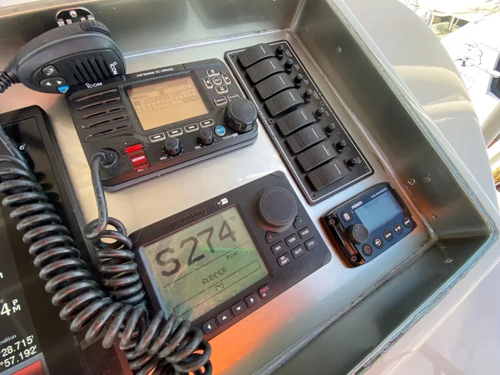  Yacht Photos Pics Control panel of a 1995 Mares 58 Power Cat with navigation and communication equipment.