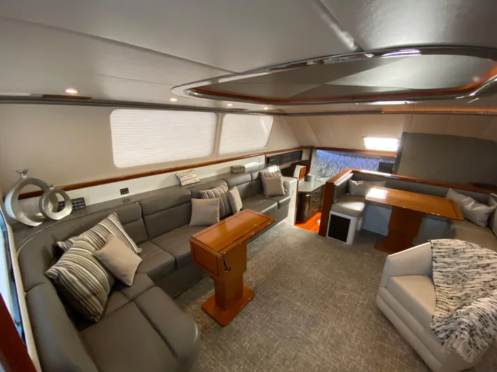  Yacht Photos Pics Luxurious interior of 1995 Mares 58 Power Cat with modern seating and elegant decor.