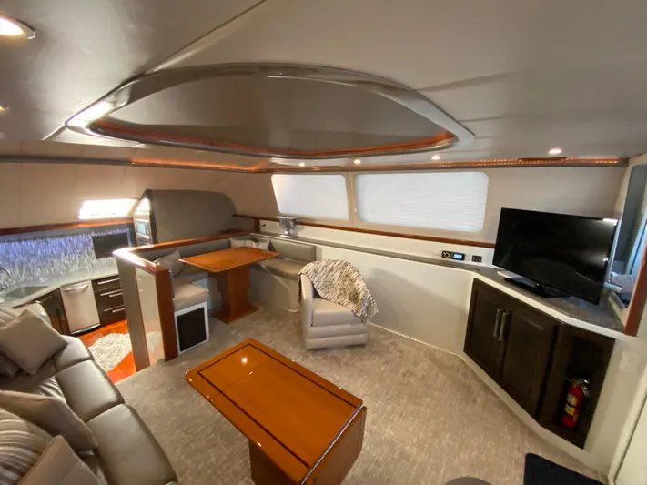  Yacht Photos Pics Luxurious interior of 1995 Mares 58 Power Cat with modern furnishings and entertainment area.