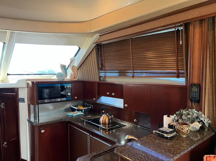  Yacht Photos Pics Luxurious kitchen interior of 2005 Sea Ray 500 Sedan Bridge yacht.