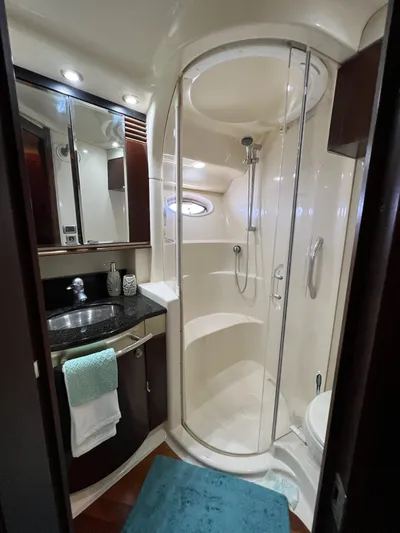  Yacht Photos Pics Luxurious bathroom in 2005 Sea Ray 500 Sedan Bridge yacht with modern shower.